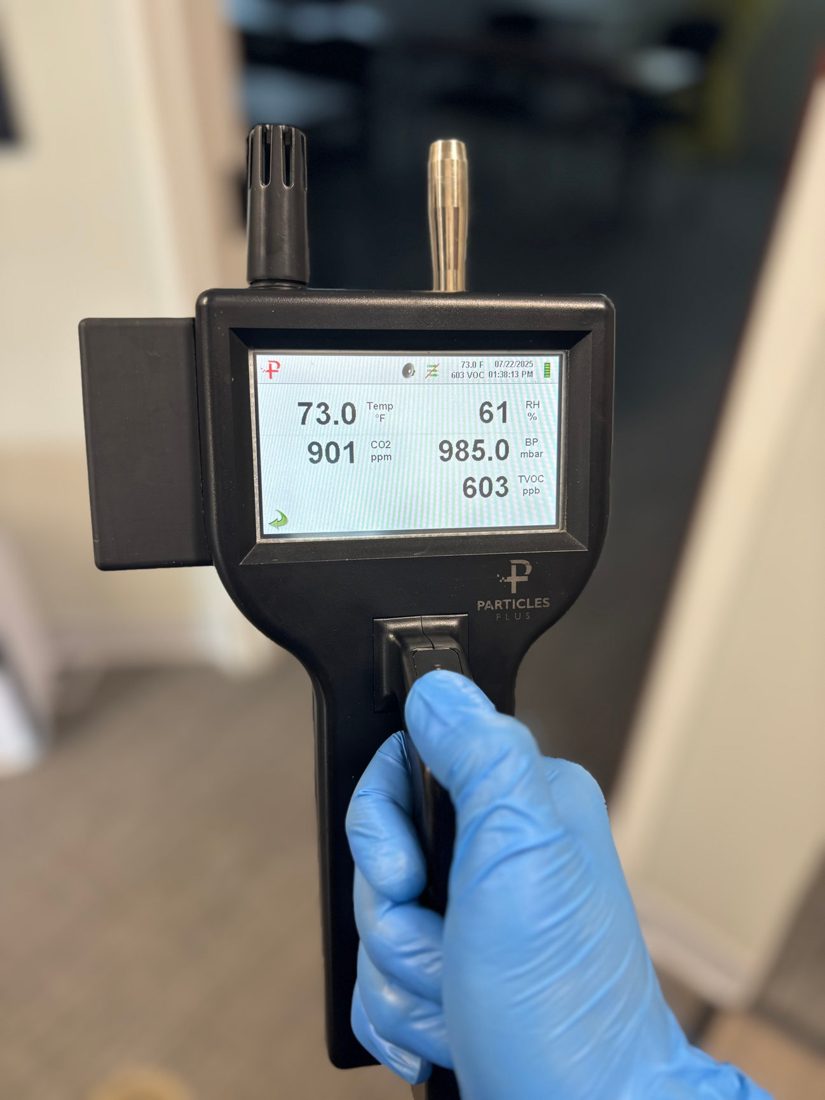 Wall-mounted monitor tracking carbon dioxide and relative humidity