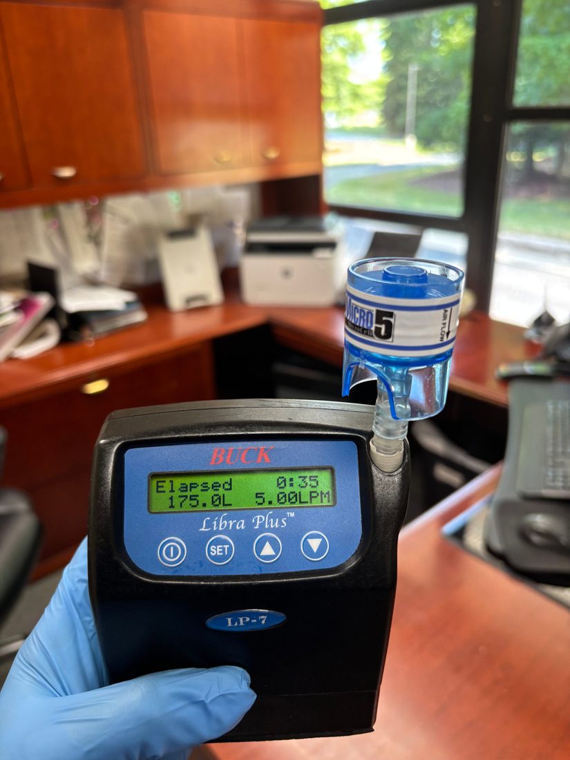 ESG air quality meter set up in a living space during a preventative checkup