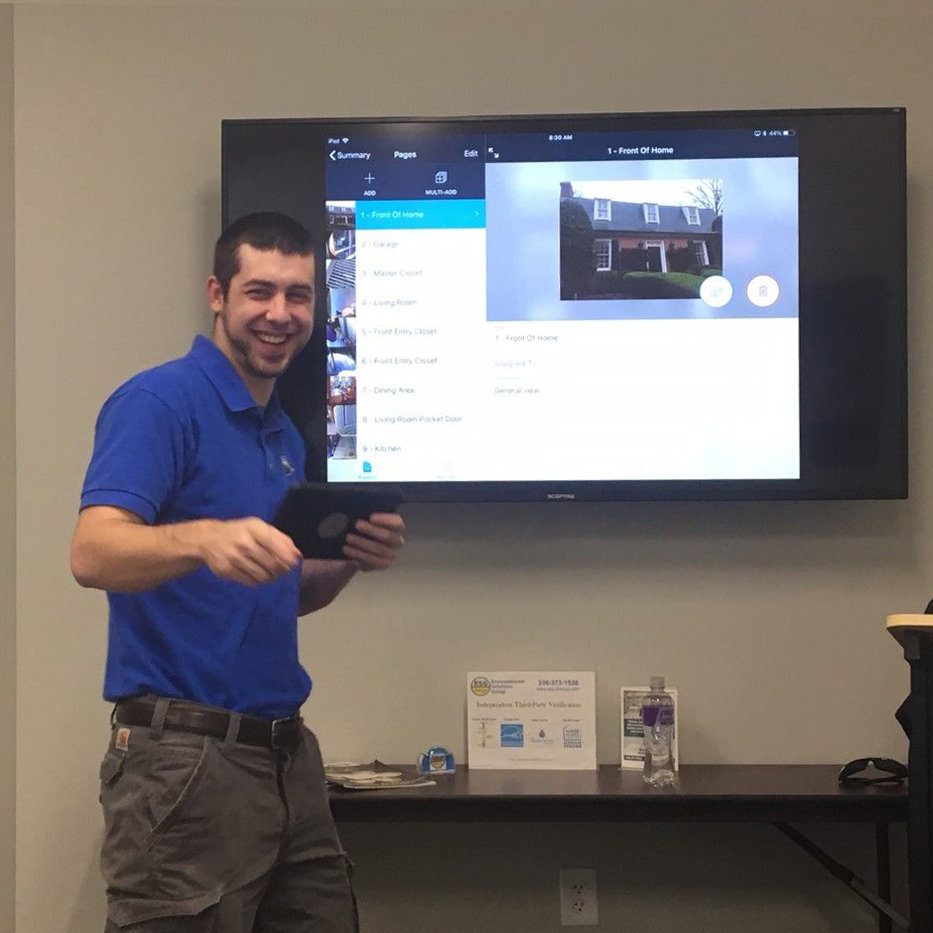 ESG professional presenting air quality findings on a screen