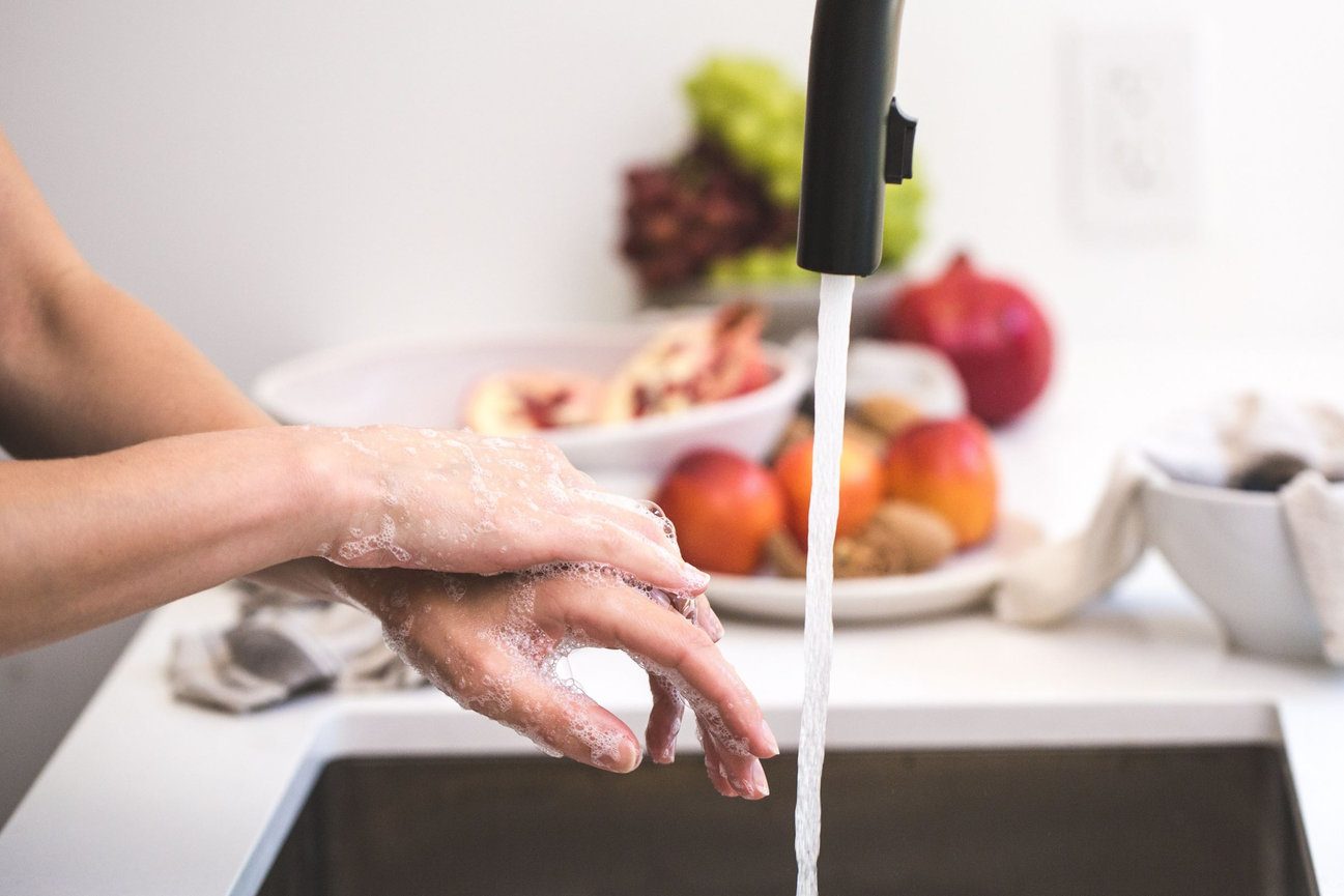 Tap water filling a sink in a North Carolina home before drinking water testing